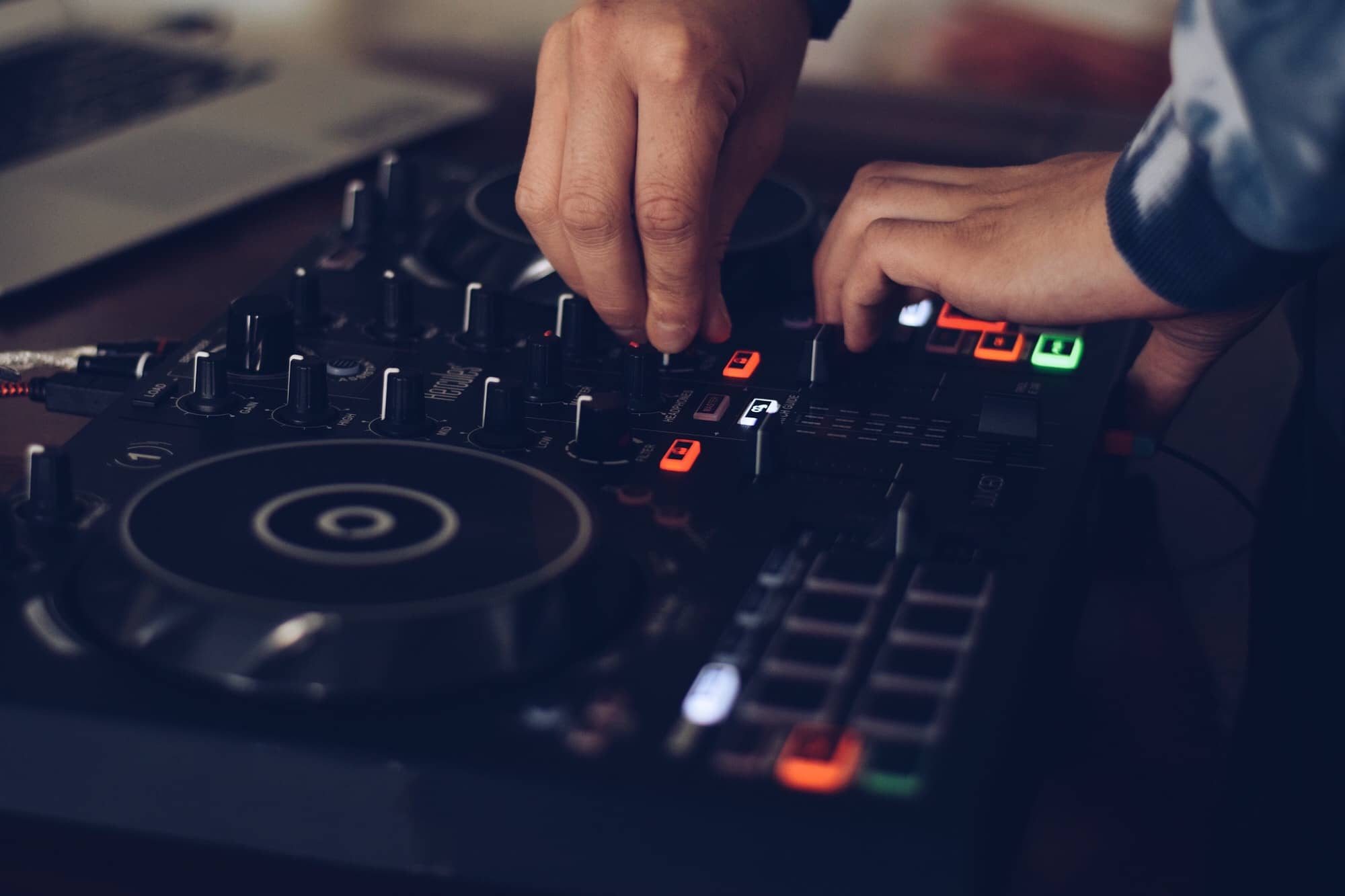 DJ mixing music on a digital turntable